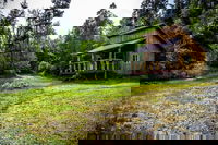 Midnight Sun Log Cabins