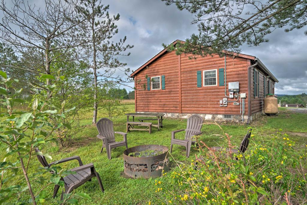 Rustic Benezette Cabin With Porch, Hot Tub & Fire Pit - thumb 1
